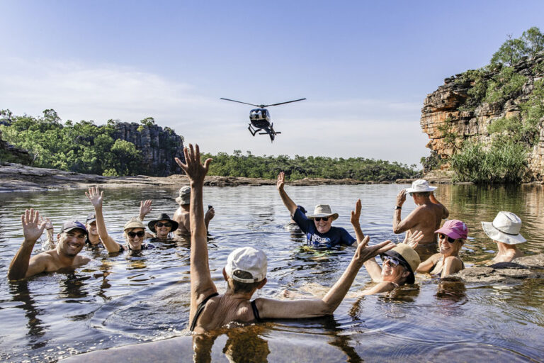 Everyone enjoying a Kimberley helicopter picnic